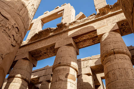 Different hieroglyphs on the walls and columns in the Karnak temple. Karnak temple is the largest...