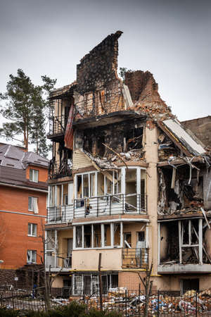 Irpin, Kyev region Ukraine - 04/09/2022: Cities of Ukraine after the Russian occupation. Destroyed buildings on the streets of Irpen. Broken, shelled windows. Buildings after being hit by missiles.のeditorial素材
