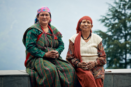 NAGGAR, INDIA - JULY 17: Typical local Indian women of North India in traditional dress for the north on July 17, 2013. Naggar, Kullu Valley, Himachal Pradesh, India.のeditorial素材