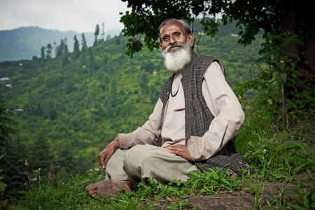 NAGGAR, INDIA - JULY 17: Typical local north of hindu in traditional clothing for the north on July 17, 2013. Naggar, Kullu Valley, Himachal Pradesh, India.のeditorial素材