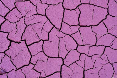 Cracked clay soil Texture, background, seamless pattern. Crack in the ground. Texture, background,...