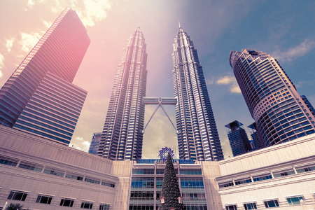 Kuala Lumpur, Malaysia - JAN, 2019: Petronas Towers and Suria KLCC Shopping Mall with christmas tree.のeditorial素材