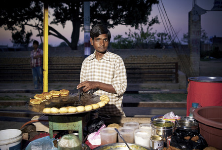 Orchha, India - November 30, 2018: Portrait of unidentified Indian man on nights market. Daily lifestyle in rural area central India.のeditorial素材