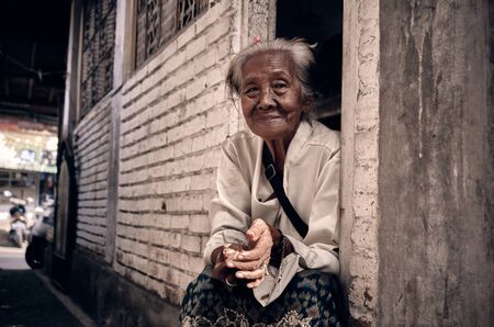Bali, Indonesia - 15 Nov 2019: Happy old asian woman. A very old Japanese woman smiles at the...