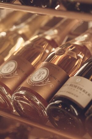 Paris, France - Dec 2019: Mood shot of brut Champagne sparkling wine Louis Roederer Cristal Rose...