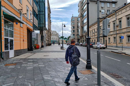 Moscow, Russia - Jul 2020: General landscape view at tradition Moscow architecture. City life on the main streets of the city. The citizens go on their own business. Automobile traffic.のeditorial素材
