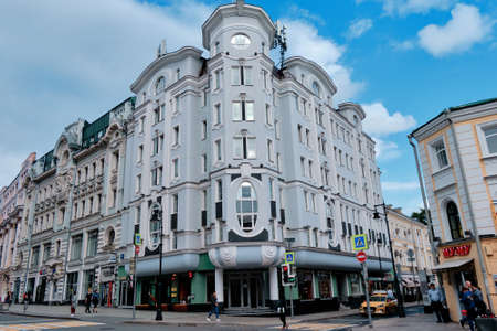 Moscow, Russia - Jul 2020: General landscape view at tradition Moscow architecture. City life on the main streets of the city. The citizens go on their own business. Automobile traffic.のeditorial素材