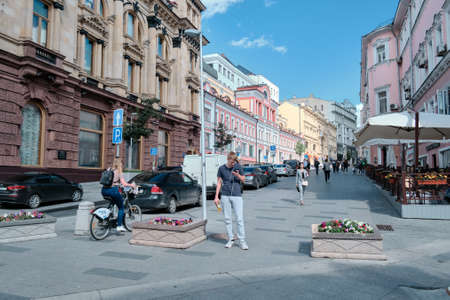 Moscow, Russia - 23 Jul 2020: General landscape view at tradition Moscow architecture. City life on the central streets of the city. The citizens go on their own business. Automobile traffic.のeditorial素材