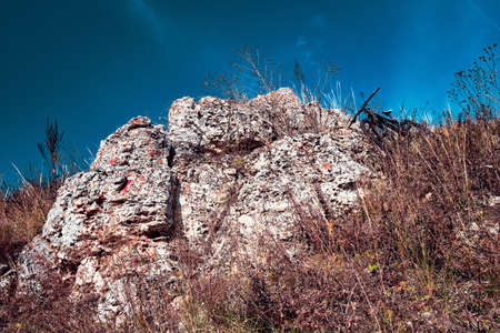 Outdoor cycling. Mountain bike in wild nature landscape background. Landscape of central Russia countryside with hill.の写真素材