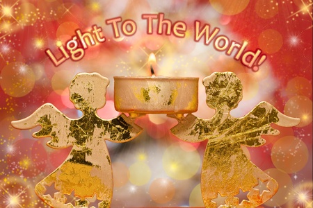 christmas angels candle Light to the world の写真素材