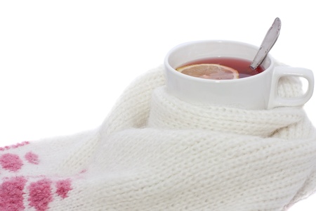 hot fruit tea with lemon wrapped in a scarf の写真素材