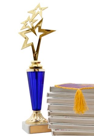 school award and books isolated on whiteの写真素材
