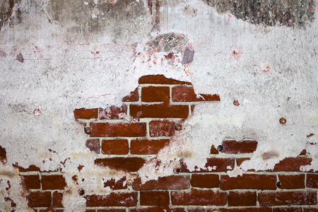 red brick with plaster background textureの写真素材