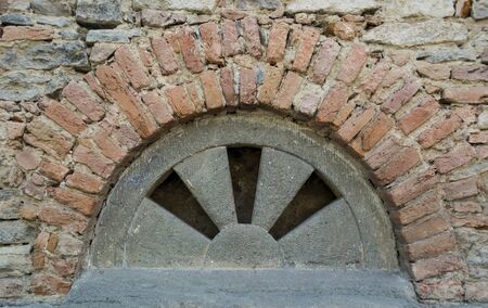 Ventilation holes in ancient building wall
の写真素材