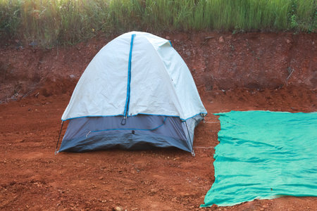camping tent in full assembled condition at camp side outdoor locationの写真素材