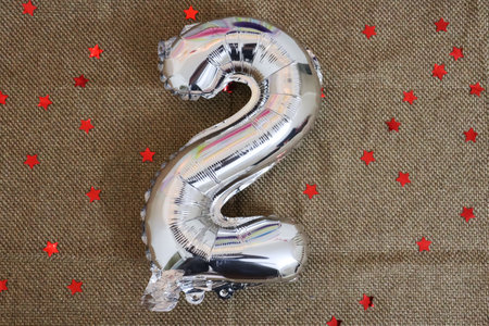 decorative background with number two with silver metallic color for birthday or anniversary representationの写真素材