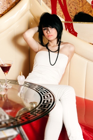 Fashionable girl in pubの写真素材