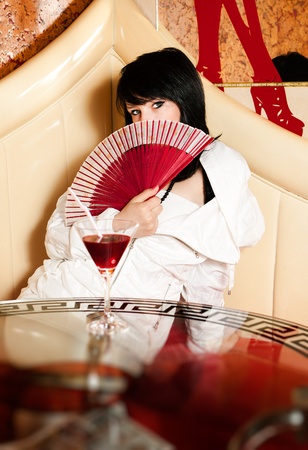 Fashionable girl in pubの写真素材