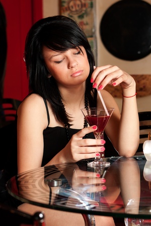 Fashionable girl in pubの写真素材