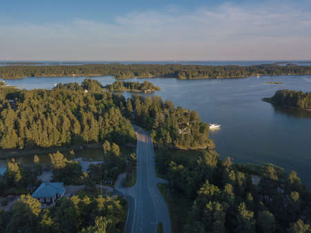 Photo from a drone over the sea, sunny evening, Scandinavian nature, yacht, Gulf of Finland, Finland. High quality photoの写真素材