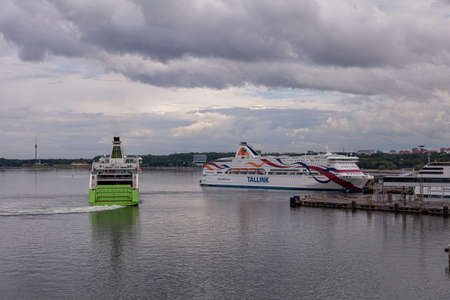 Tallinn, Harju County, Estonia, 02 July 2020 Panorama of the city, Viking Line port and Tallink ferry. High quality photoのeditorial素材