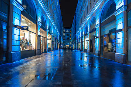 Helsinki, Finland November 30, 2020 Old town streets in the evening, decorated for Christmas, after the rain. Burning lights and reflections. High quality photoのeditorial素材
