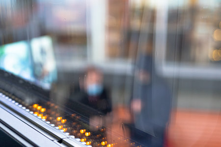 Defocus, background. people communicate in masks. High quality photo