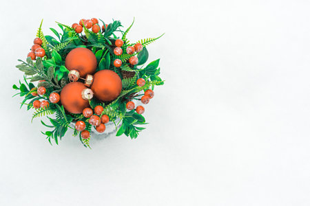 Christmas bouquet in an aluminum bucket against a background of white snow. There is a place for text .Concept, winter background, merry christmas greetings, valeentin. High quality photoの写真素材