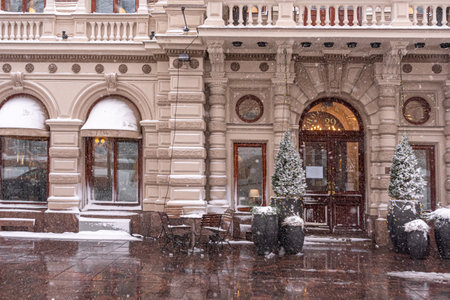 Helsinki, Finland. January 12, 2021. Medieval Scandinavian Architecture. Winter, city landscape, people. Heavy snow is falling. Panorama of the city. High quality photoのeditorial素材