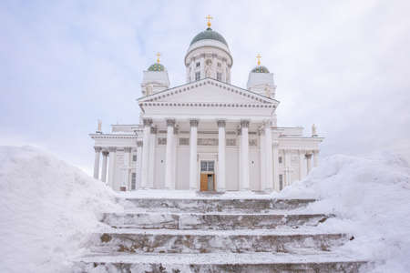 White Church in the snow in winter, on Senate Square in Helsinki. High quality photoの写真素材