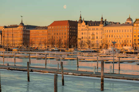 Finland, Helsinki, March 3, 2021 Dawn, Spring panorama of Helsinki, view of the Katajanokka and Krununhakka districts in the foreground the Gulf of Finlandのeditorial素材