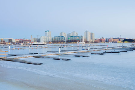 Finland, Helsinki, March 3, 2021 Dawn, spring panorama of Helsinki, view of Hakaniemi districts in the foreground Gulf of Finlandのeditorial素材