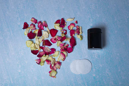 Dry rose petals, cream bottle, cotton swabs ERの写真素材