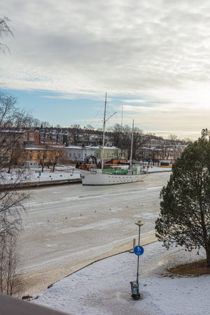 Porvoo, Finland, March 3, 2021. Winter river in Porvoo and surrounding architecture along the banksのeditorial素材
