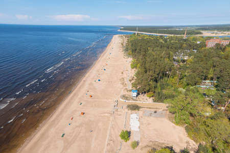 Estonia, narva jÃµesuu, May 26, 2021 Coast of the Gulf of Finland, sandy coast Summer day, drone view of the resort town at the mouth of the Narva in the Baltic Statesの写真素材