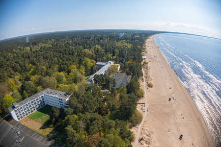 Estonia, narva jÃµesuu, May 26, 2021 Coast of the Gulf of Finland, sandy coast Summer day, drone view of the resort town at the mouth of the Narva in the Baltic Statesのeditorial素材