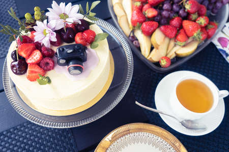 Festive table, served. Cake and tea utensils Congratulation concept. Birthday