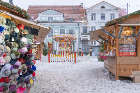 Tallinn. Estonia. December 3, 2021 in the city, Christmas market. Snow on the streets, New Year's moodのeditorial素材