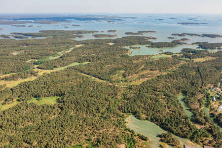 Photo from a drone, on a sunny summer day, a view of the islands in the sea. Finland, Turku. Nature...