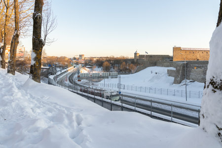 Narva Estonia. December 5, 2021 View of the DRUZHBA bridge, across the NAROVA river. view in winter. Border between Estonia and Russiaのeditorial素材