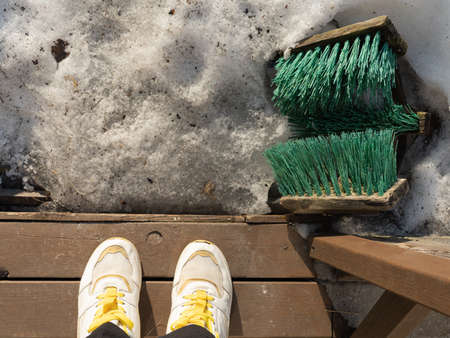 Brush on the street for cleaning shoes. View from aboveの写真素材