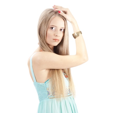 Beautiful woman with elegant blue sundress over white. Fashion photoの写真素材