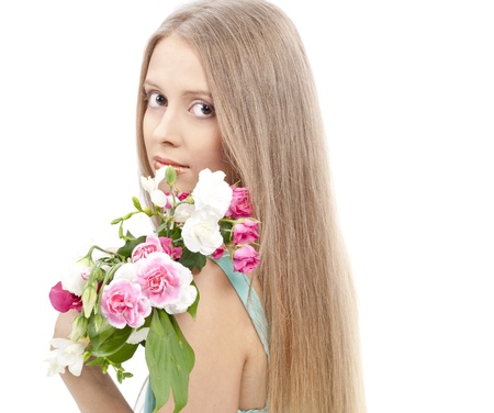 Beautiful woman with flowers in elegant blue sundress over white. Fashion photoの写真素材
