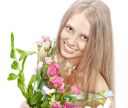 Beautiful woman with flowers in elegant blue sundress over white. Fashion photoの写真素材