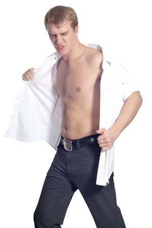 Young handsome male model in shirt posing over whiteの写真素材