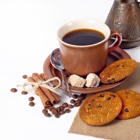 Coffee background with cinnamon, cookies, brown sugar and beansの写真素材