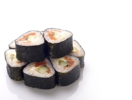sushi roll isolated on white with cucumberの写真素材