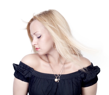 Photo of beautiful woman with magnificent blond hair over whiteの写真素材