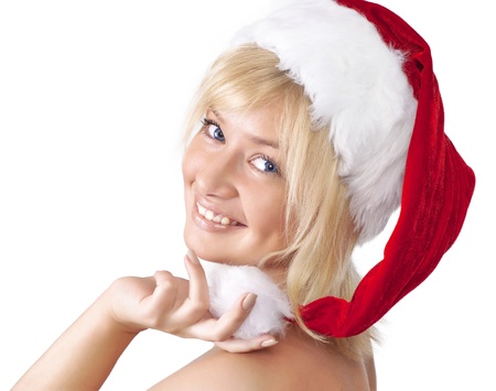 Beautiful smiling young woman in Santa Claus hat, portrait over whiteの写真素材