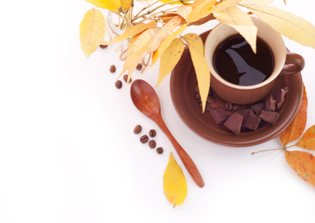 Cup of coffee, breakfast background Cup of coffee, beans and chocolate with Autumn leavesの写真素材